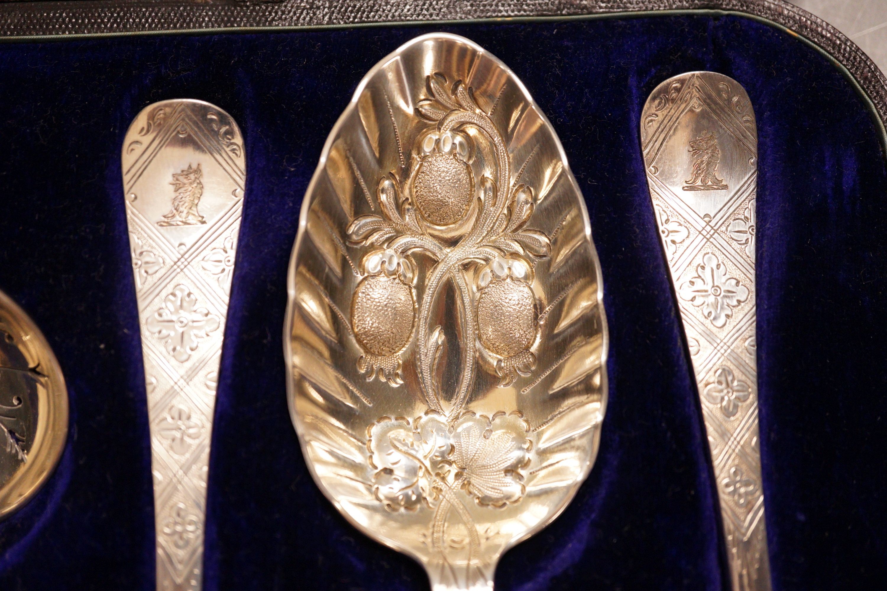 A cased set of Mappin & Webb plated berry spoons